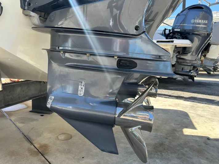  Yacht Photos Pics Outboard motor of 2022 Tidewater 280 CC boat with Yamaha engine in sunlight.