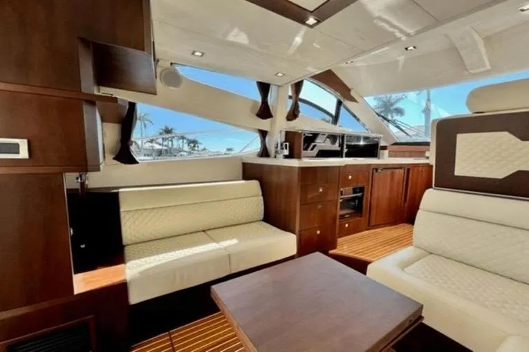 Yacht Photos Pics Luxurious interior of 2017 Galeon 380 Fly yacht with elegant wood and leather finishes.