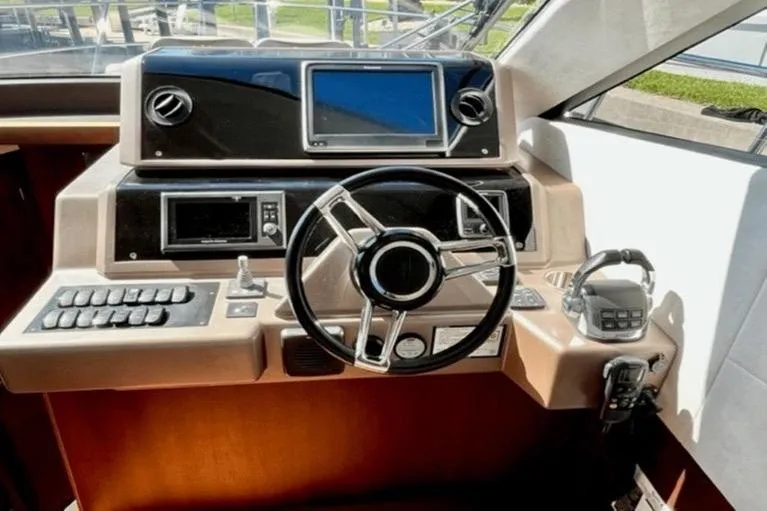  Yacht Photos Pics Helm of 2017 Galeon 380 Fly yacht with modern controls and navigation system.