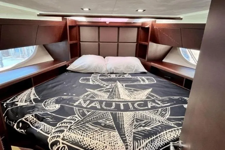  Yacht Photos Pics Luxurious bedroom in 2017 Galeon 380 Fly yacht with nautical-themed bedding.