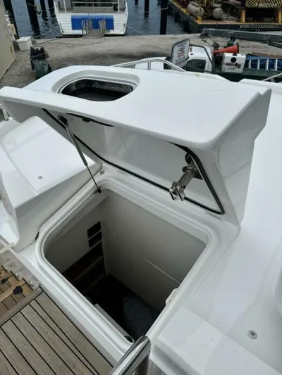 Above Deck Yacht Photos Pics 2018 Princess S60 yacht hatch open, revealing interior access.
