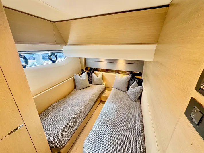 Above Deck Yacht Photos Pics Interior of 2018 Princess S60 yacht with twin beds and modern design.