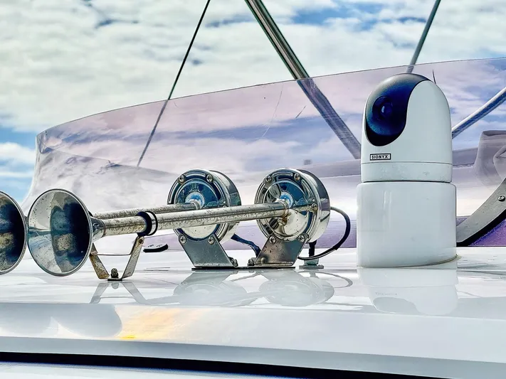 Above Deck Yacht Photos Pics Close-up of a 2018 Princess S60 yacht's horn and camera system on deck.