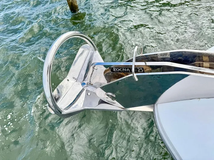 Above Deck Yacht Photos Pics Stainless steel anchor on 2018 Princess S60 yacht in water.