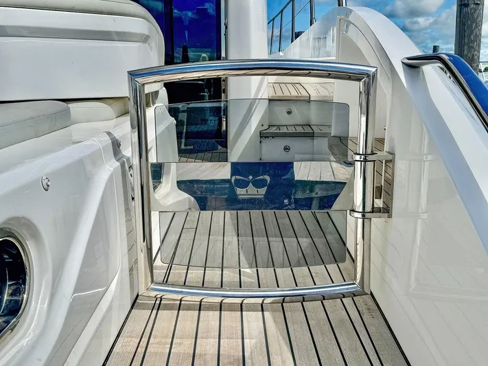 Above Deck Yacht Photos Pics Luxury yacht Princess S60, 2018 model, featuring sleek deck design and chrome accents.