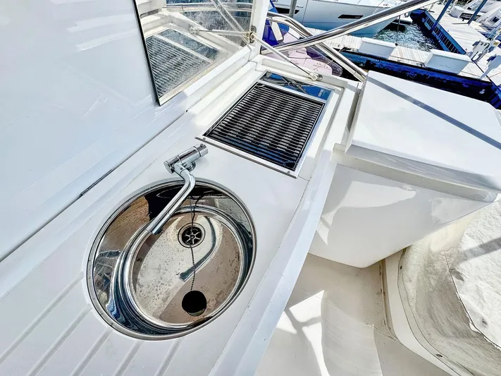Above Deck Yacht Photos Pics Outdoor sink and grill on 2018 Princess S60 yacht deck.