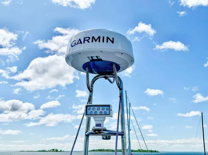 Above Deck Yacht Photos Pics Garmin radar on 2018 Princess S60 yacht against a clear blue sky.