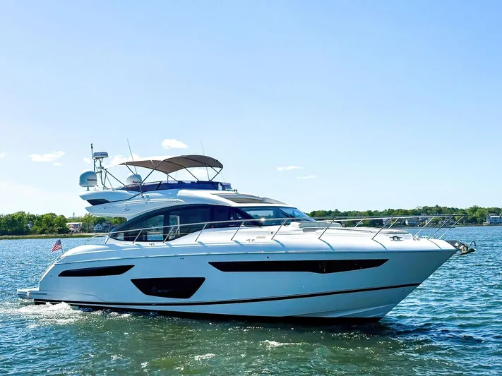 Above Deck Yacht Photos Pics 2018 Princess S60 yacht cruising on a sunny day.