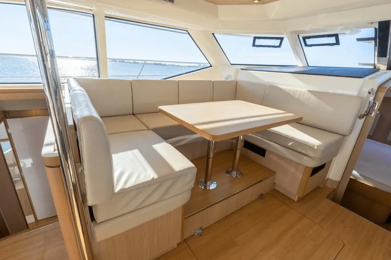 Cay Sera Yacht Photos Pics Interior of 2019 Aquila 44 yacht with cozy seating area.