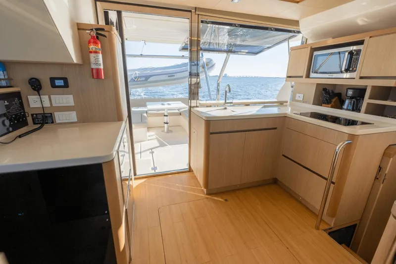 Cay Sera Yacht Photos Pics Interior of 2019 Aquila 44 yacht featuring modern kitchen.
