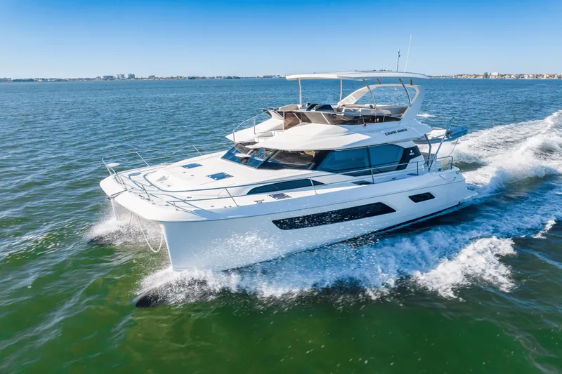 Cay Sera Yacht Photos Pics 2019 Aquila 44 yacht cruising on open water.