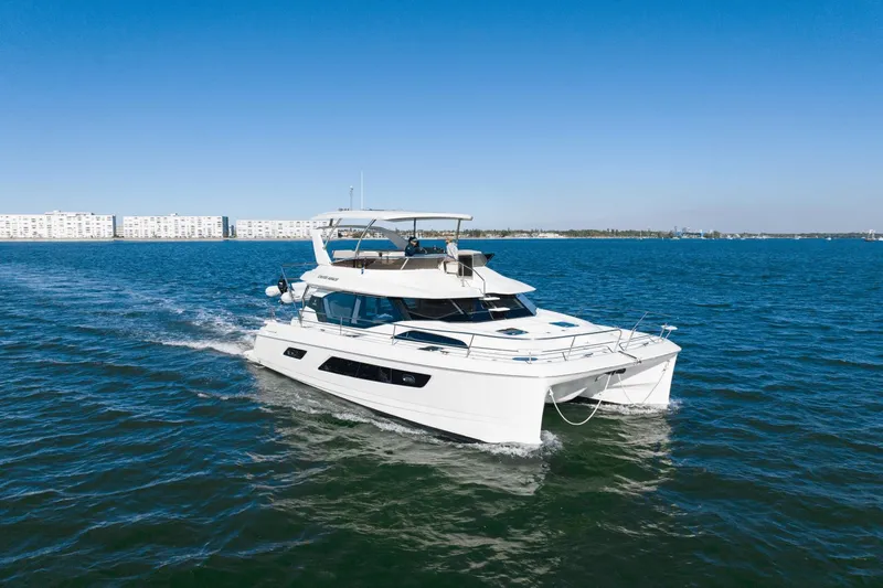 Cay Sera Yacht Photos Pics 2019 Aquila 44 yacht cruising on open water.