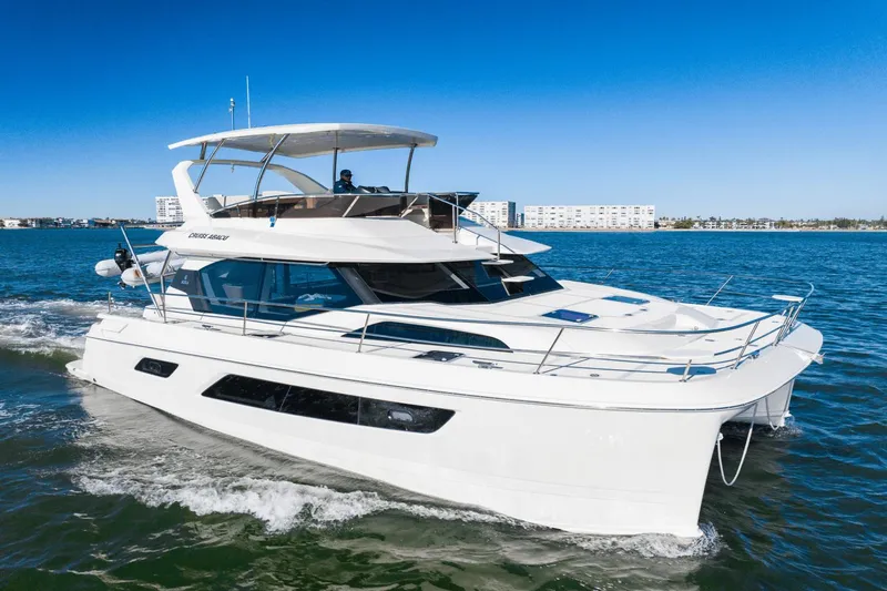 Cay Sera Yacht Photos Pics 2019 Aquila 44 yacht cruising on open water.