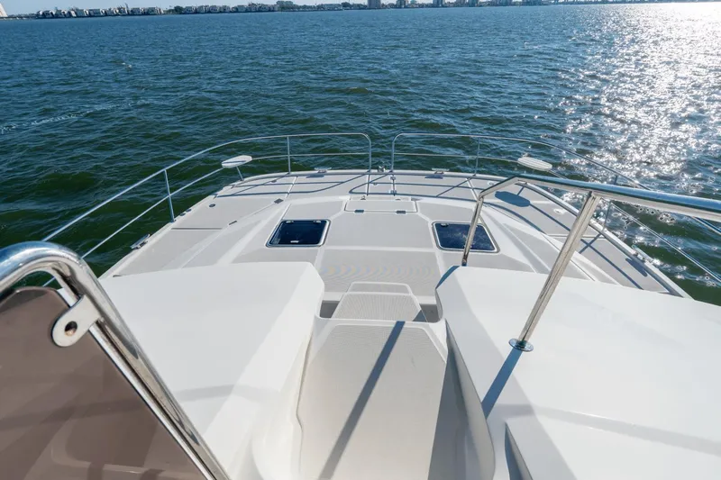 Cay Sera Yacht Photos Pics Aquila 44 yacht from 2019 on calm waters.