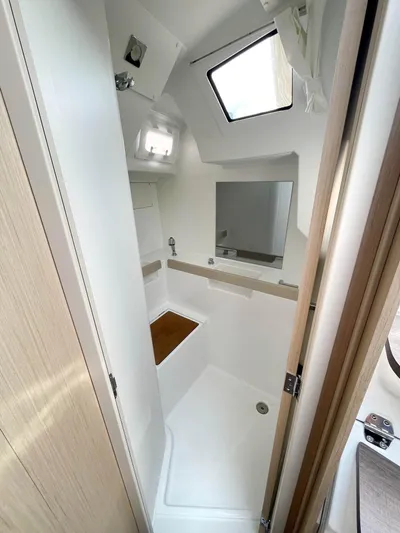 Odyssey Yacht Photos Pics Beneteau Oceanis 38.1 2022 bathroom with modern fixtures and natural light.