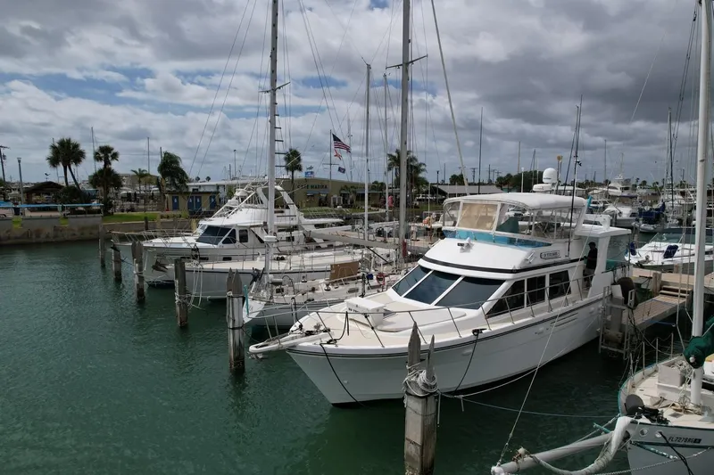 Jefferson Rivanna 50 Sdmy Yacht Photos Pics Docked 2005 Jefferson Rivanna 50 SDMY yacht in a marina under cloudy skies.