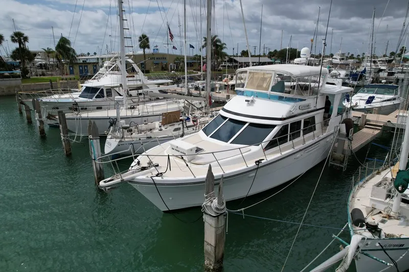 Jefferson Rivanna 50 Sdmy Yacht Photos Pics 2005 Jefferson Rivanna 50 SDMY yacht docked in a marina, surrounded by sailboats.