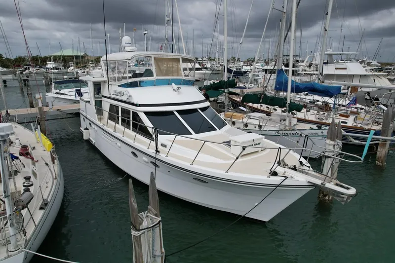 Jefferson Rivanna 50 Sdmy Yacht Photos Pics 2005 Jefferson Rivanna 50 SDMY yacht docked in a marina under cloudy skies.