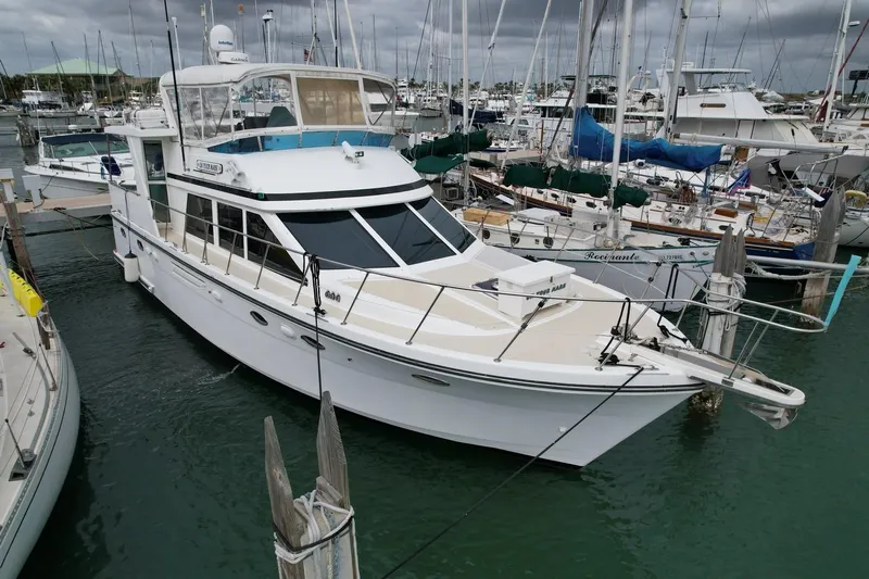 Jefferson Rivanna 50 Sdmy Yacht Photos Pics 2005 Jefferson Rivanna 50 SDMY yacht docked in a marina, surrounded by other boats.