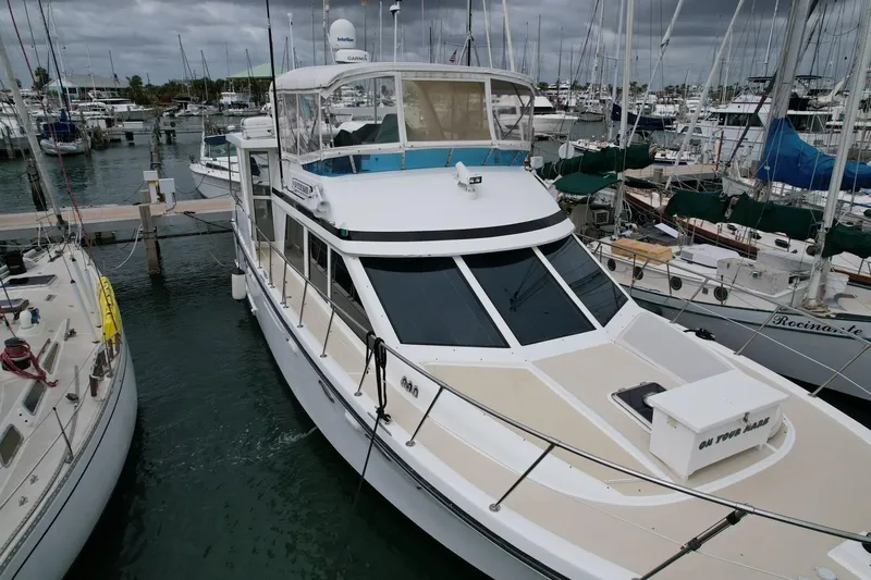 Jefferson Rivanna 50 Sdmy Yacht Photos Pics 2005 Jefferson Rivanna 50 SDMY yacht docked in a marina, surrounded by sailboats.