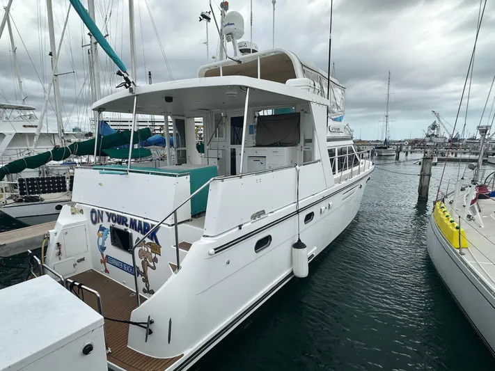Jefferson Rivanna 50 Sdmy Yacht Photos Pics 2005 Jefferson Rivanna 50 SDMY yacht docked in a marina under cloudy skies.