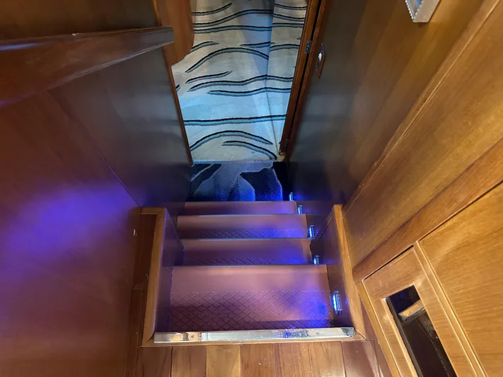 Jefferson Rivanna 50 Sdmy Yacht Photos Pics Staircase with blue LED lights on a 2005 Jefferson Rivanna 50 SDMY yacht.