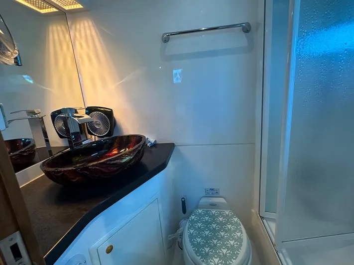 Jefferson Rivanna 50 Sdmy Yacht Photos Pics Luxurious bathroom on 2005 Jefferson Rivanna 50 SDMY yacht with vessel sink and shower.