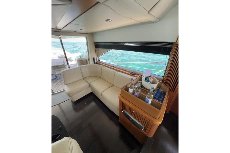  Yacht Photos Pics Luxurious interior of 2007 Sunseeker Manhattan 66 yacht with cream leather seating and ocean view.
