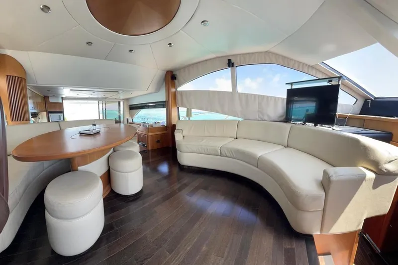  Yacht Photos Pics Luxurious interior of 2007 Sunseeker Manhattan 66 yacht with elegant seating and modern design.