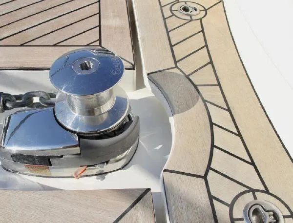  Yacht Photos Pics Anchor winch on Absolute 70 yacht, 2012 model, with teak deck detailing.