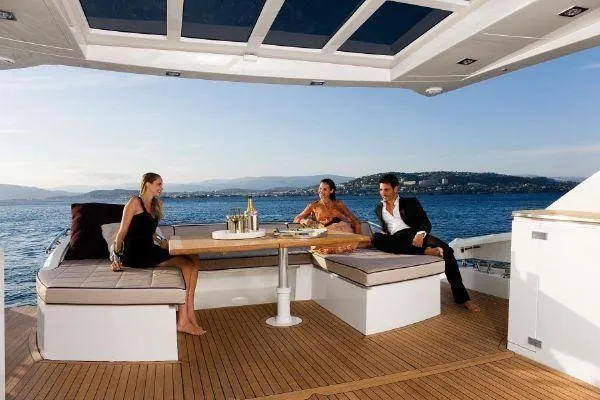  Yacht Photos Pics Luxury yacht deck with people enjoying drinks, Absolute 70 model, 2012.