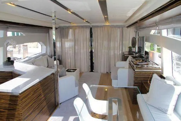  Yacht Photos Pics Luxurious interior of a 2012 Absolute 70 yacht with modern furnishings and elegant design.