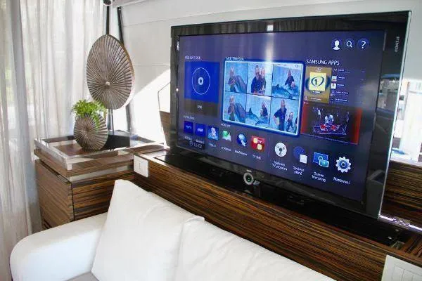  Yacht Photos Pics Luxurious interior of 2012 Absolute 70 yacht with modern TV and elegant decor.