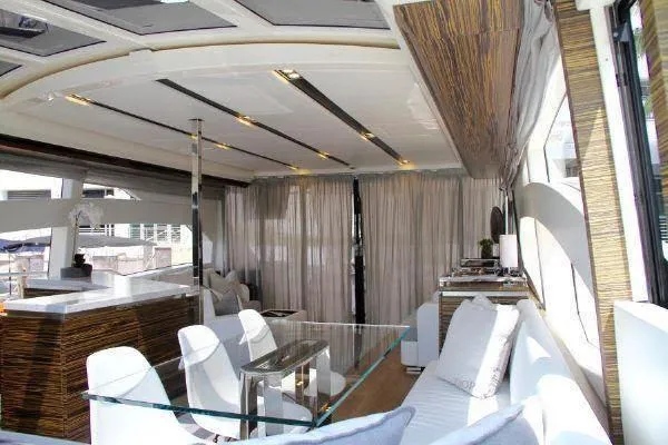  Yacht Photos Pics Luxurious interior of a 2012 Absolute 70 yacht with modern furnishings and elegant design.
