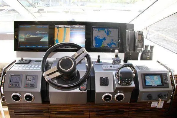  Yacht Photos Pics Cockpit of 2012 Absolute 70 yacht with advanced navigation systems and controls.