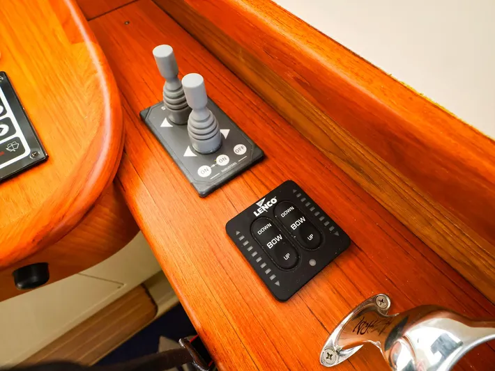 4814ak Yacht Photos Pics Control panel on a 2009 Legacy 32 boat with joystick and Lenco trim tab controls.