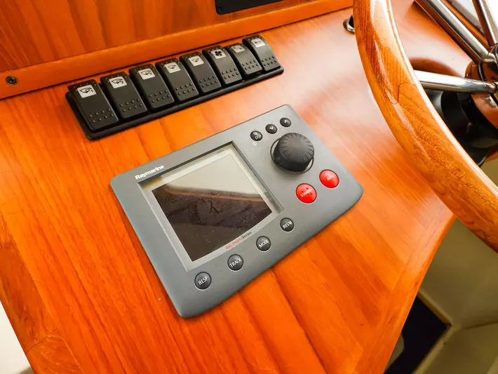 4814ak Yacht Photos Pics Boat dashboard with navigation controls on a 2009 Legacy 32.