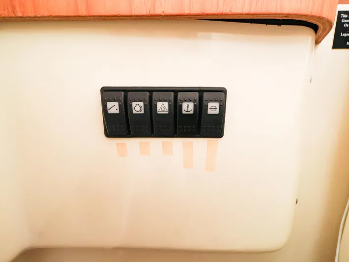 4814ak Yacht Photos Pics Control panel with five switches on a 2009 Legacy 32 boat.
