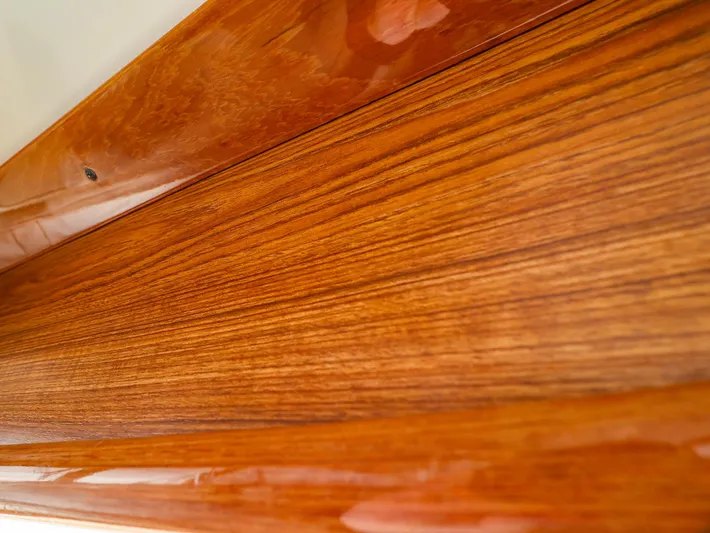 4814ak Yacht Photos Pics Polished wooden surface detail from a 2009 Legacy 32 model.