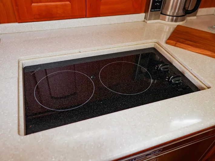 4814ak Yacht Photos Pics Built-in electric cooktop with two burners on a Legacy 32, 2009 model kitchen counter.