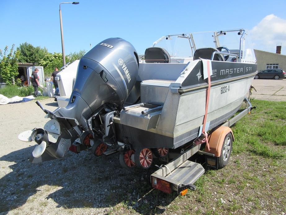 2016 Master Pro 571 boat on trailer with Yamaha outboard motor.