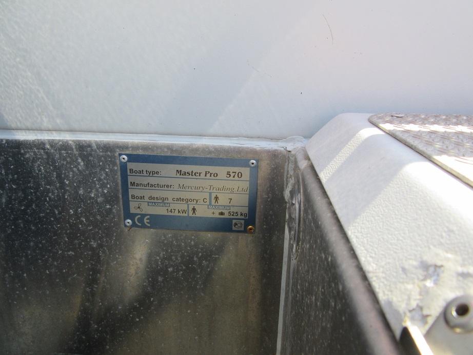 Plaque on Master Pro 570 boat, showing specifications and manufacturer details.