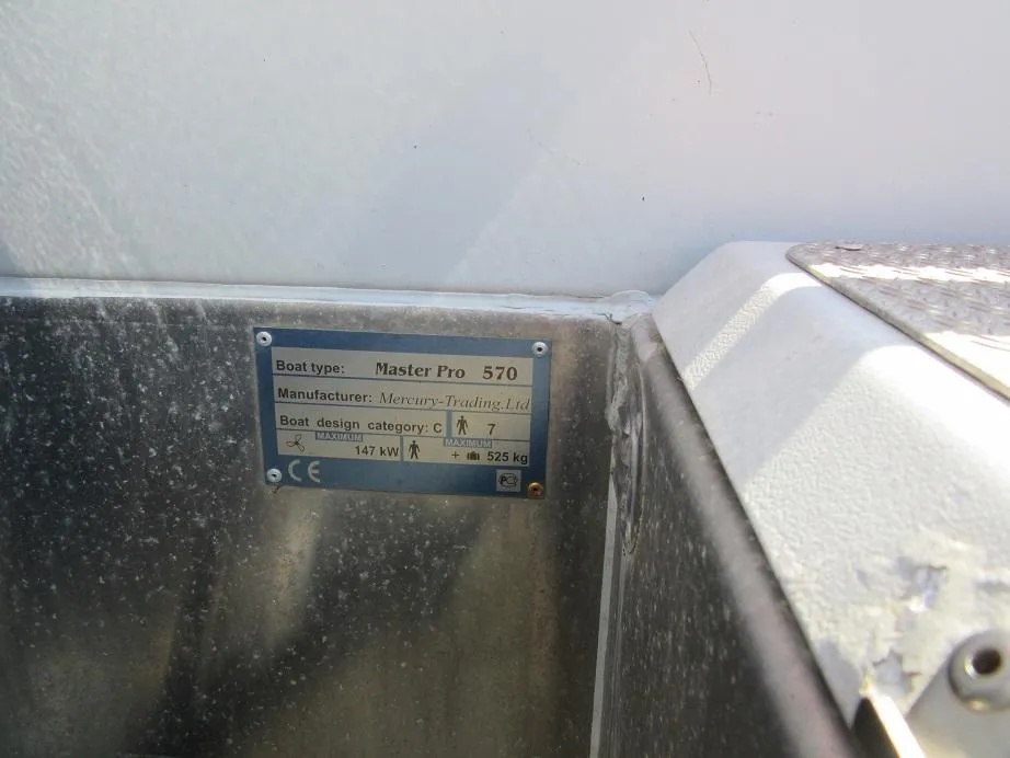 Plaque on Master Pro 570 boat, showing specifications and manufacturer details.