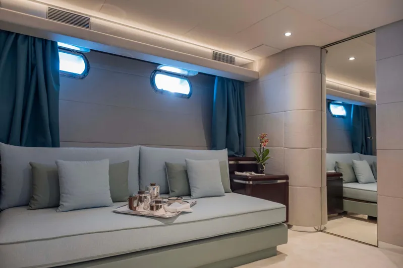 Bellini Yacht Photos Pics Luxurious interior of 1988 Cantieri di Pisa AKHIR 30 yacht with elegant seating and decor.