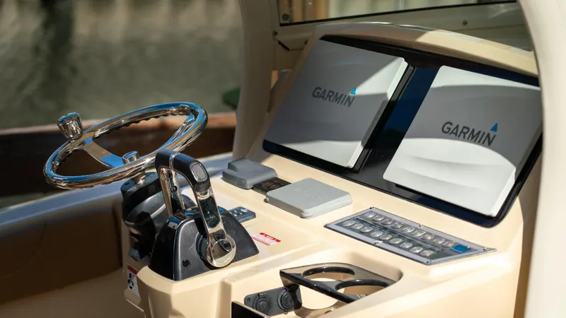  Yacht Photos Pics 2019 Scout 275 LXF boat dashboard with Garmin navigation displays.