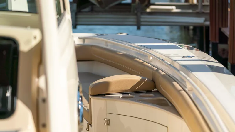  Yacht Photos Pics 2019 Scout 275 LXF boat interior with tan seating and sleek design.