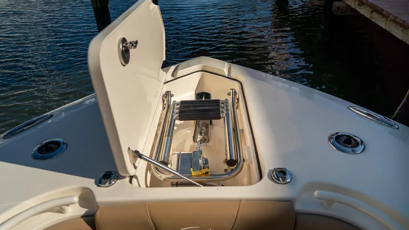  Yacht Photos Pics 2019 Scout 275 LXF boat with open anchor storage compartment on deck.