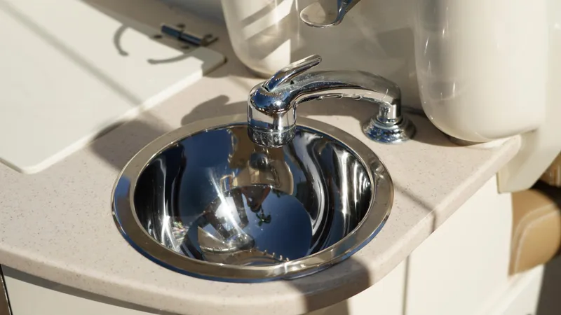  Yacht Photos Pics Stainless steel sink and faucet on 2019 Scout 275 LXF boat.