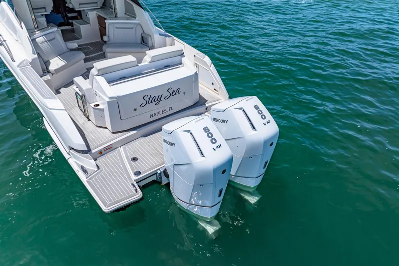  Yacht Photos Pics 2022 Tiara Yachts 43 LE with dual Mercury engines on water.