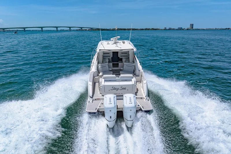  Yacht Photos Pics 2022 Tiara Yachts 43 LE cruising on open water, showcasing powerful dual engines.
